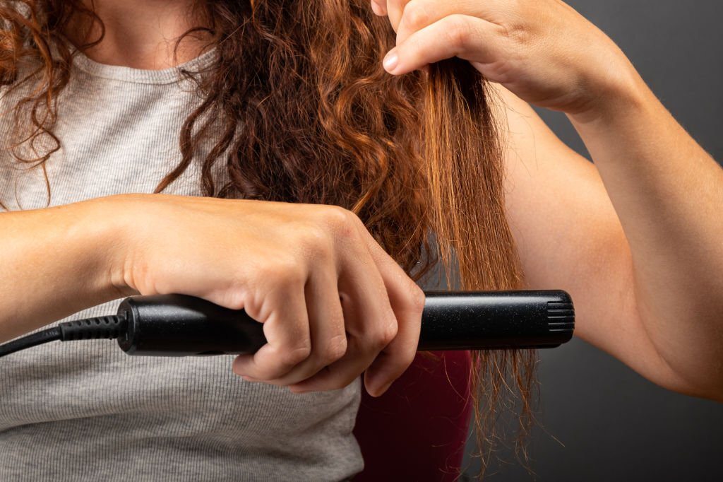 how to use a hair straightener